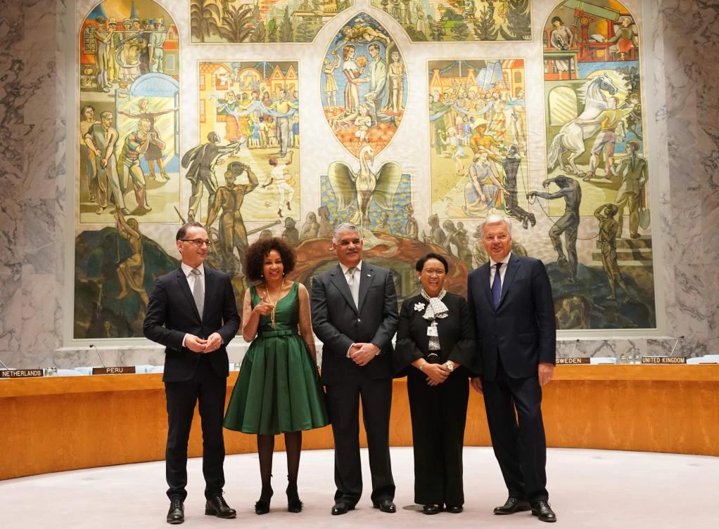(L to R) The Foreign Ministers from Germany, Heiko Maas; South Africa, Lindiwe Sisulu; Dominican Republic, Miguel Vargas; Indonesia, Retno Marsudi and Belgium, Didier Reynders; pose for photos on the floor of the Security Council afetr a General Assembly meeting to elect the five non-permanent members of the Security Council June 8 at the United Nations in New York. (AFP)
