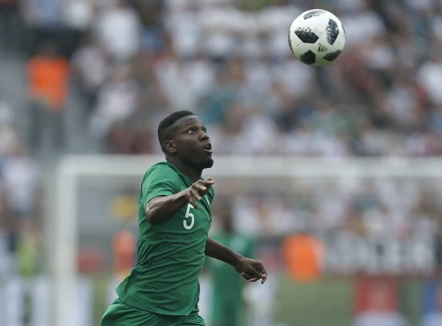 Saudi Arabia's defender Omar Hawsawi plays the ball during the international friendly football match between Germany and Saudi Arabia at the BayArena stadium in Leverkusen, western Germany, on June 8, 2018. (AFP)