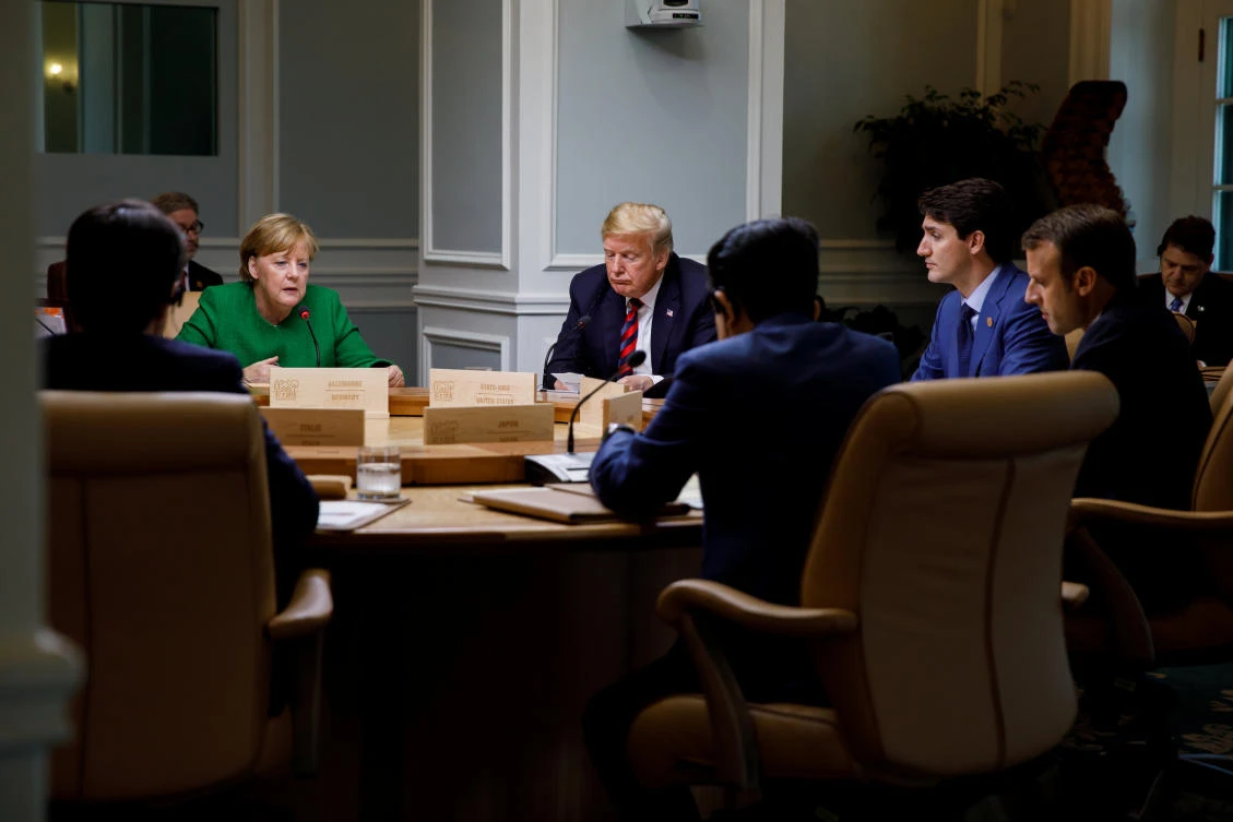 Canada's Prime Minister Justin Trudeau and G7 leaders France's President Emmanuel Macron, Germany's Chancellor Angela Merkel, Japan's Prime Minister Shinzo Abe and U.S. President Donald Trump take part in a working session on the first day of the G7 meeting in Charlevoix city of La Malbaie, Quebec, Canada, June 8, 2018. (Reuters)