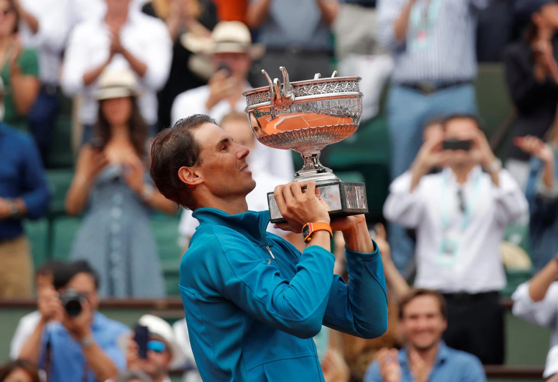 Rafael Nadal celebrates with the trophy after winning the final against Austria's Dominic Thiem. (Reuters)