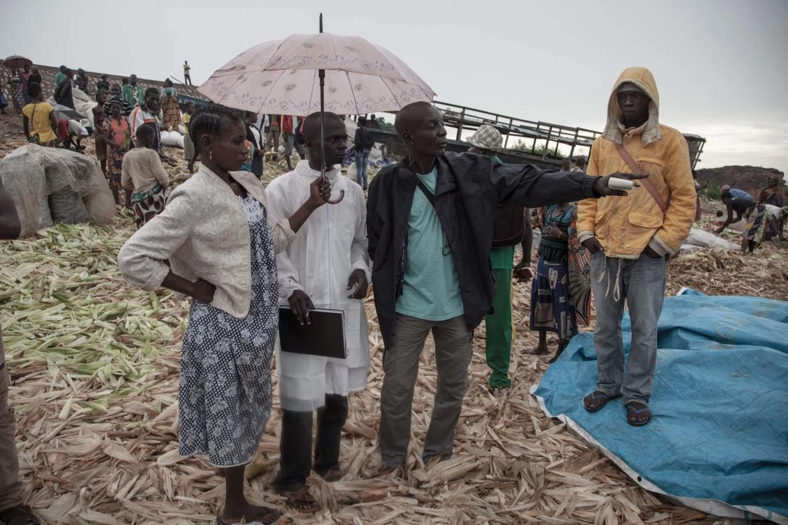 Health workers from the Democratic Republic of Congo’s health ministry wait to monitor the temperature of travelers in a port of Bangui on June 3. The ebola outbreak is DR Congo’s ninth since the first in 1976. (AFP)