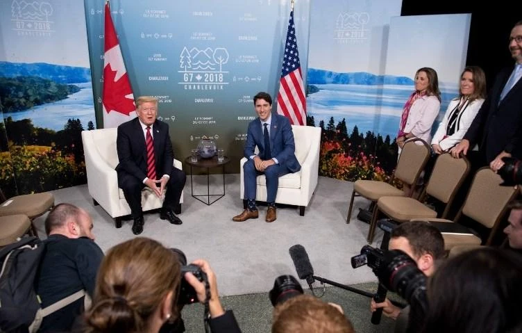 US President Donald Trump and Canadian Prime Minister Justin Trudeau hold a meeting on the sidelines of the G7 Summit in La Malbaie, Quebec on Friday, June 8. (AFP)