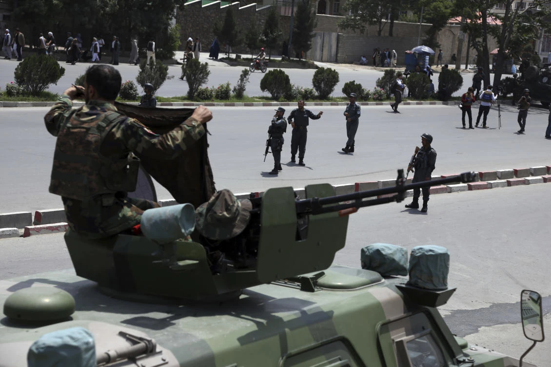 Afghan security personnel arrive at the site of suicide attack in Kabul, Afghanistan, Monday, June 4, 2018. (AP)
