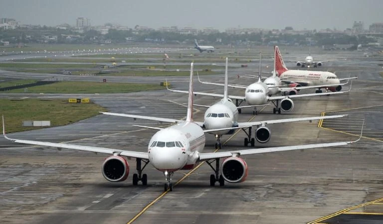 Aircraft queue at the Mumbai tarmac in preparation for their take-off. Passenger traffic in India has grown at about 20 percent annually in recent years, making the world’s fastest-growing aviation market lucrative for large and small planemakers. (AFP)