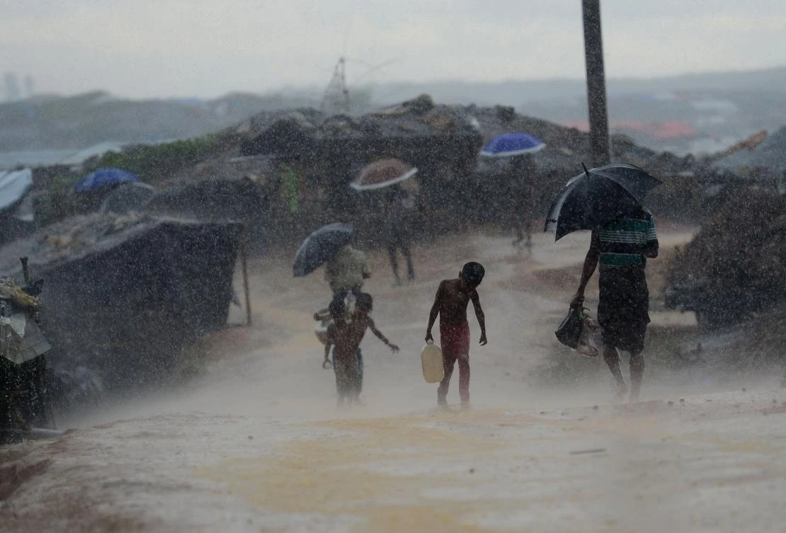The first monsoon rains have pounded camps in Bangladesh housing around a million Rohingya refugees, triggering floods and landslides but for now no casualties or major damage, officials said on June 10. (Munir UZ ZAMAN/AFP)