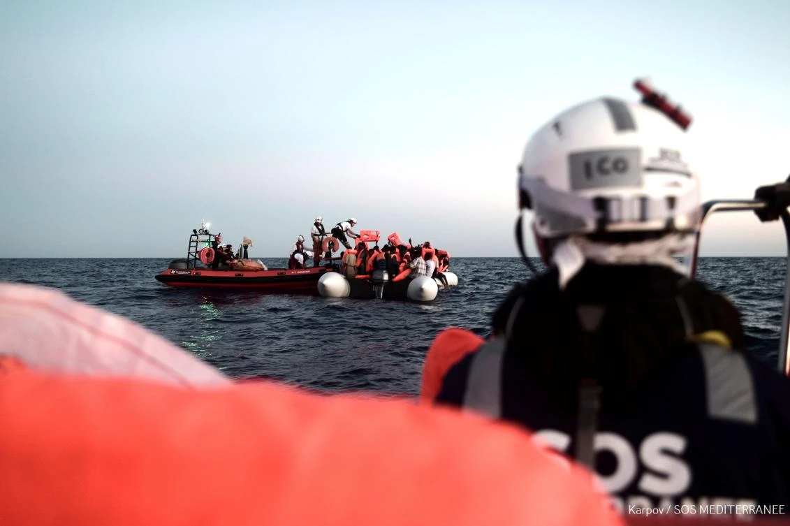 Photo handout taken in a search and rescue zone in the Mediterranean sea, June 9, 2018, by ‘SOS Mediterranee’ NGO shows migrants being rescued. (AFP)