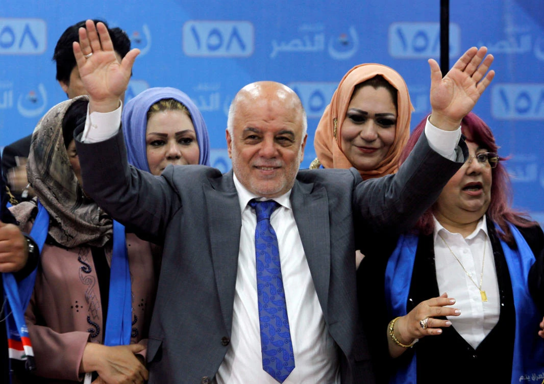 File photo showing Iraqi Prime Minister Haidar Al-Abadi attends the election campaign, along with his supporters in Kirkuk, Iraq April 28, 2018. (Reuters)