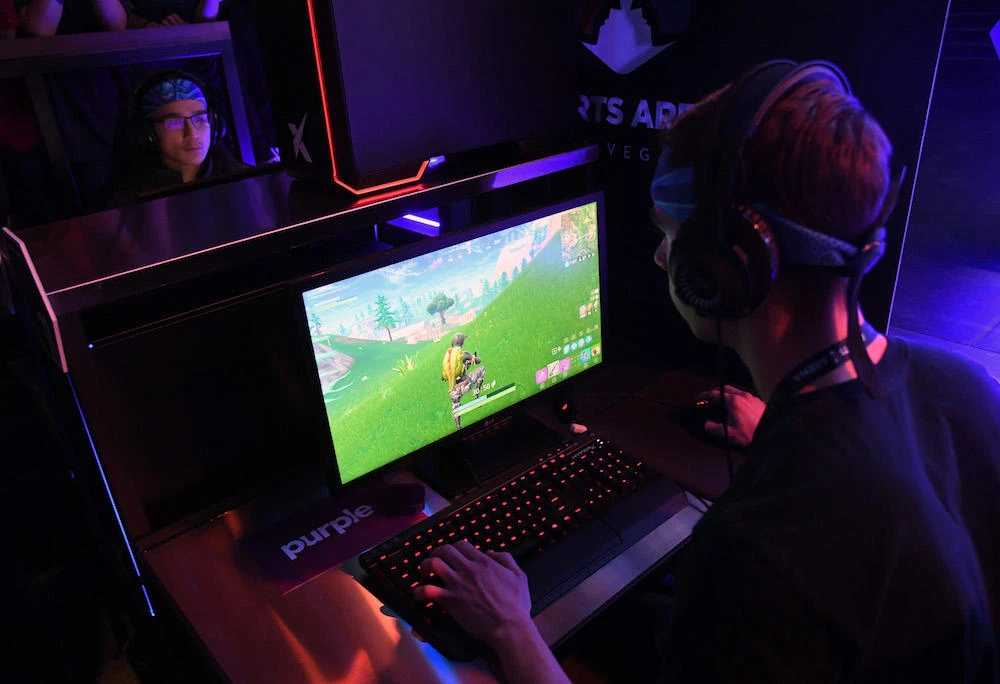 Gamers play 'Fortnite' against Twitch streamer and professional gamer Tyler 'Ninja' Blevins during Ninja Vegas '18 at Esports Arena, Luxor Hotel and Casino, in Las Vegas, Nevada. (Getty Images)