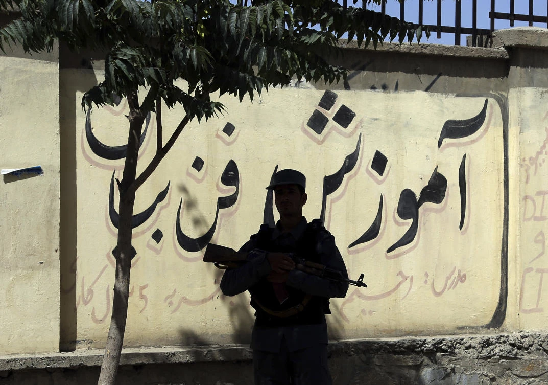 A policeman stands guard near the site of a deadly suicide attack, in Kabul, Afghanistan, Monday, June 11, 2018. (Rahmat Gul/AP)