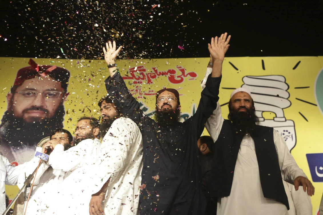 The Election Commission blocks the way of Milli Muslim League party to take part in the July 25 vote when people will elect members of the National Assembly and four provincial legislatures. (K.M. Chaudary/AP)
