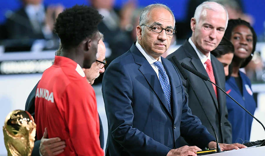 President of the United States Football Carlos Cordeiro, center, thanks the Saudi leadership for backing the North American bid. (AFP)