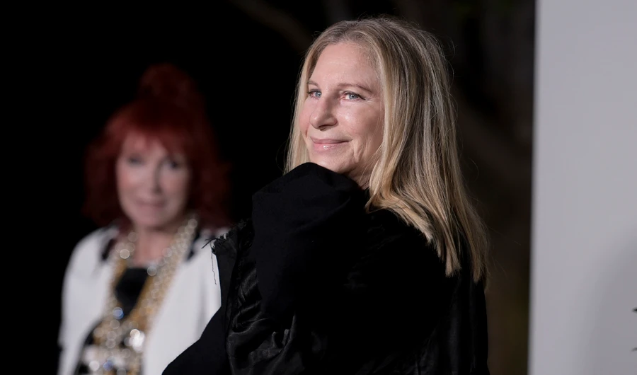 Streisand is giving an early thumbs-up to the fourth version of the romance between a rising young performer and a fading one. (Invision/AP)