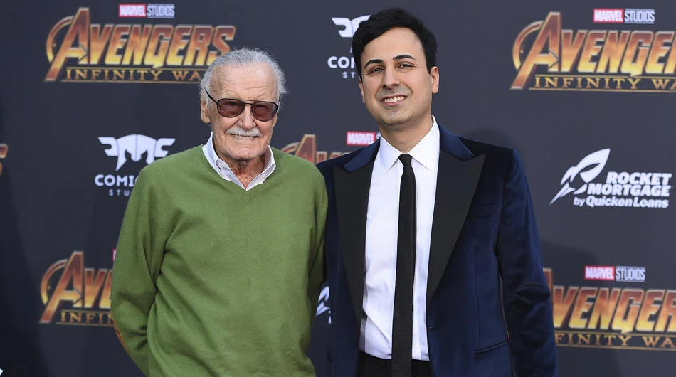 In this April 23, 2018 file photo, Stan Lee, left, and Keya Morgan arrive at the world premiere of "Avengers: Infinity War" in Los Angeles. Lee has taken out a restraining order against Morgan who had been acting as his business manager and close adviser. (Photo by Jordan Strauss/Invision/AP, File)
