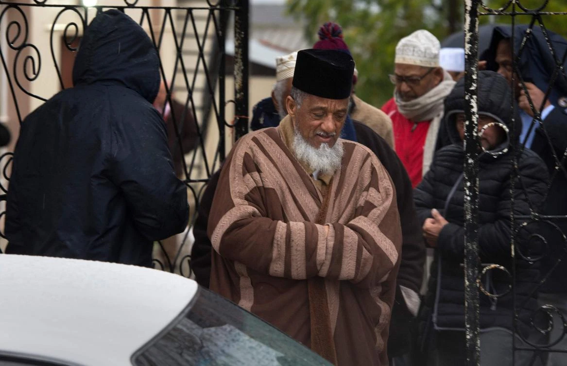 Clerics emerge after visiting a Malmesbury mosque, 50 kilometers north of Cape Town, where two worshippers were stabbed dead. (AFP)