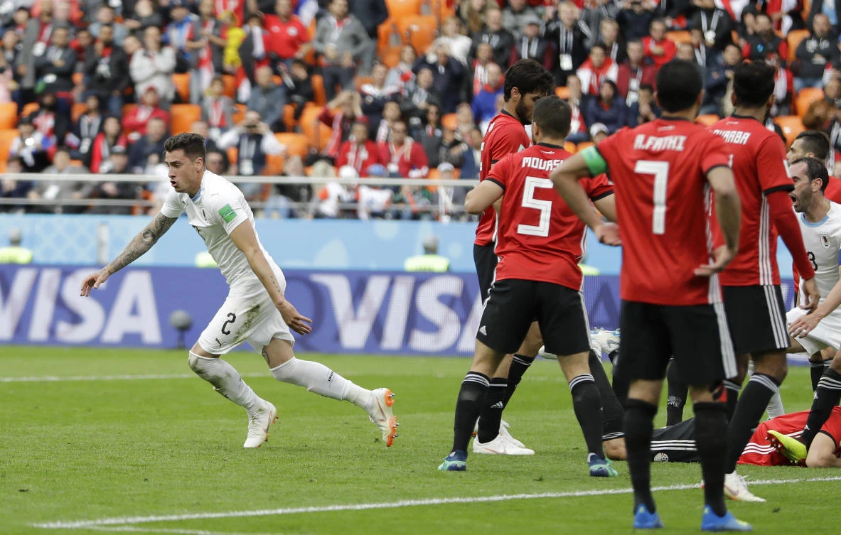 Uruguay's Jose Gimenez wheels away after scoring the winning goal against Egypt. (AP)