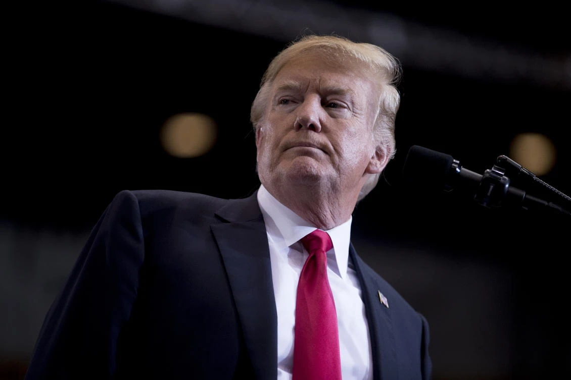 President Donald Trump pauses while speaking at a rally at the Nashville Municipal Auditorium, in Nashville, Tennessee (File Photo: Andrew Harnik/AP)