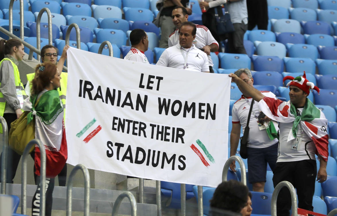 People supporting Iranian women are holding a banner at the stands during the group B match between Morocco and Iran at the 2018 soccer World Cup in the St. Petersburg Stadium in St. Petersburg, Russia, Friday, June 15, 2018. (AP)