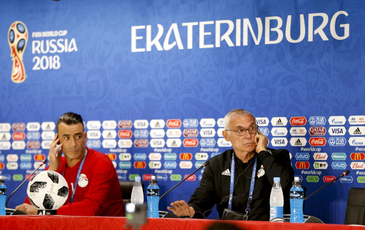 Egypt head coach Hector Cuper, right, and goalkeeper Essam El Hadary attend a press conference on the eve of the group A match between Egypt and Uruguay at the 2018 soccer World Cup in the Yekaterinburg Arena in Yekaterinburg, Russia, Thursday, June 14, 2018. (AP)
