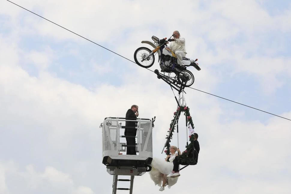 Vows in the air: German couple married in tightrope wedding
