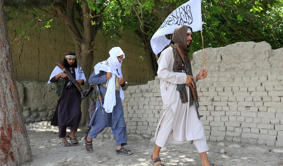 Taliban walk as they celebrate ceasefire in Ghanikhel district of Nangarhar province, Afghanistan on June 16, 2018. (REUTERS)