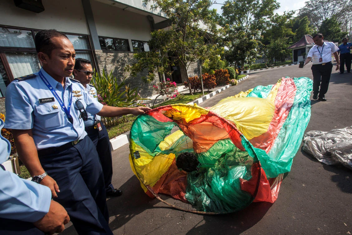 Officers show an unmanned hot air balloon, used in traditional festivities for celebrating Eid Al-Fitr, during a press conference at AirNav Indonesia, in Yogyakarta (Antara Foto/ Andreas Fitri Atmoko/via Reuters)