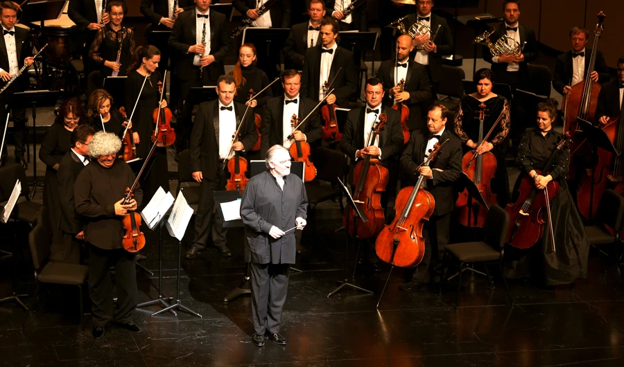 Valery Gergiev arrives at the stage for The Mariinsky Orchestra at King Abdul Aziz Center for World Culture (Ithra) in Dhahran, Saudi Arabia. (Reuters)