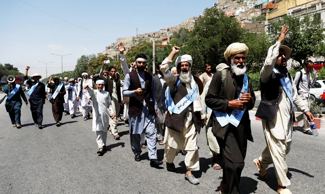 Afghan peace marchers arrive in Kabul on Monday. Reuters