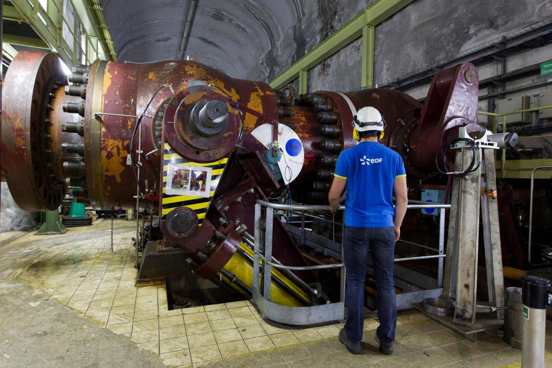 Above, inside the EDF-managed hydroelectric power station in Orelle of Maurienne Valley. France has faced a wave of protests over the last two months from workers in the travel and energy sectors. (Reuters)