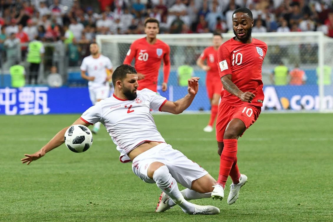 Syam Ben Youssef challenges Raheem Sterling for the ball during Tunisia's Group G clash with England at the 2018 World Cup. (AFP)