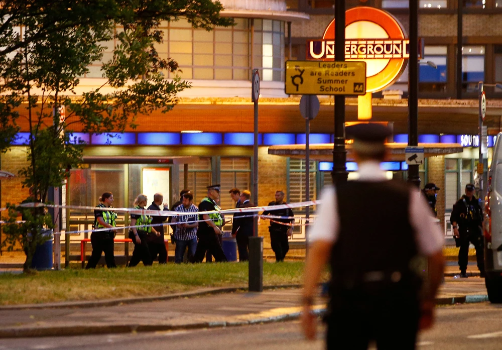 Police attend the scene after several people were injured after a small explosion at Southgate Underground station in north London on June 19, 2018. (REUTERS/Henry Nicholls)