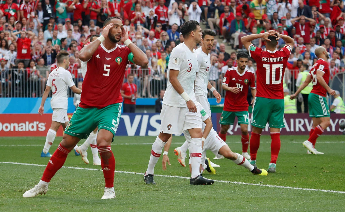 Medhi Benatia and Younes Belhanda react after a chance went begging for Morocco. (Reuters)