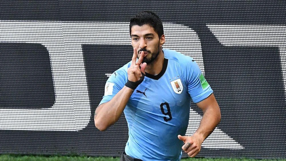 Luis Suarez scores as Uruguay and Russia advance at World Cup, Saudi Arabia and Egypt exit