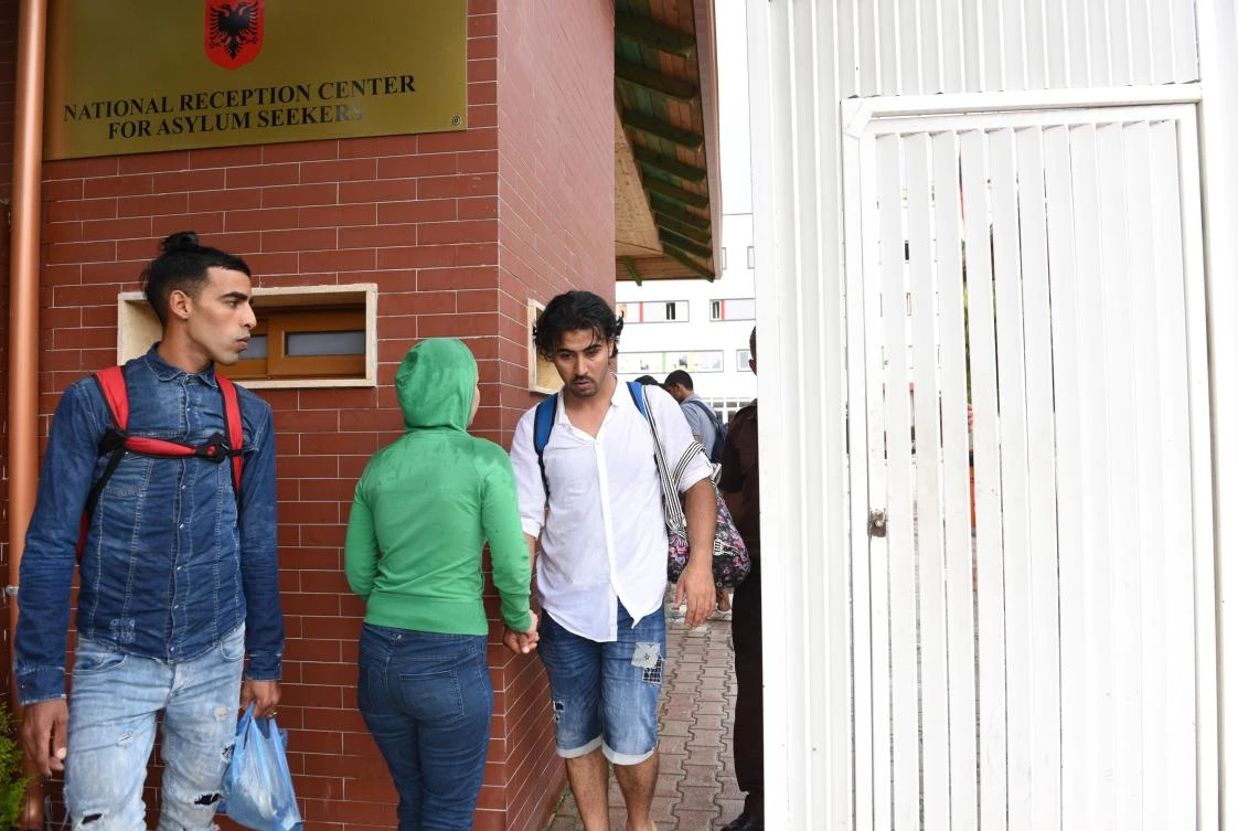Refugees leave Albania’s National Reception Center for Asylum Seekers in Tirana. Migrants are looking at Albania as a probable gateway to Europe, given that other Balkan countries are tightening their border controls. (AFP)