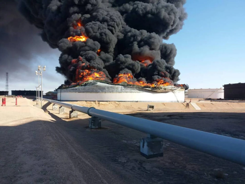 Libyan forces claim control of oil crescent despite renewed fighting
