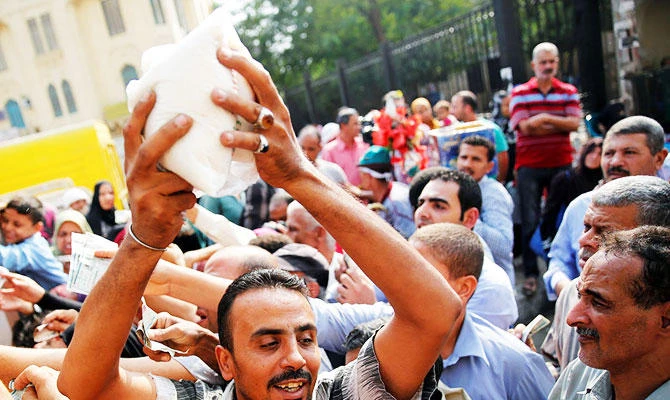 Price hikes of essential commodities leave common Egyptians struggling to make ends meet. Reuters