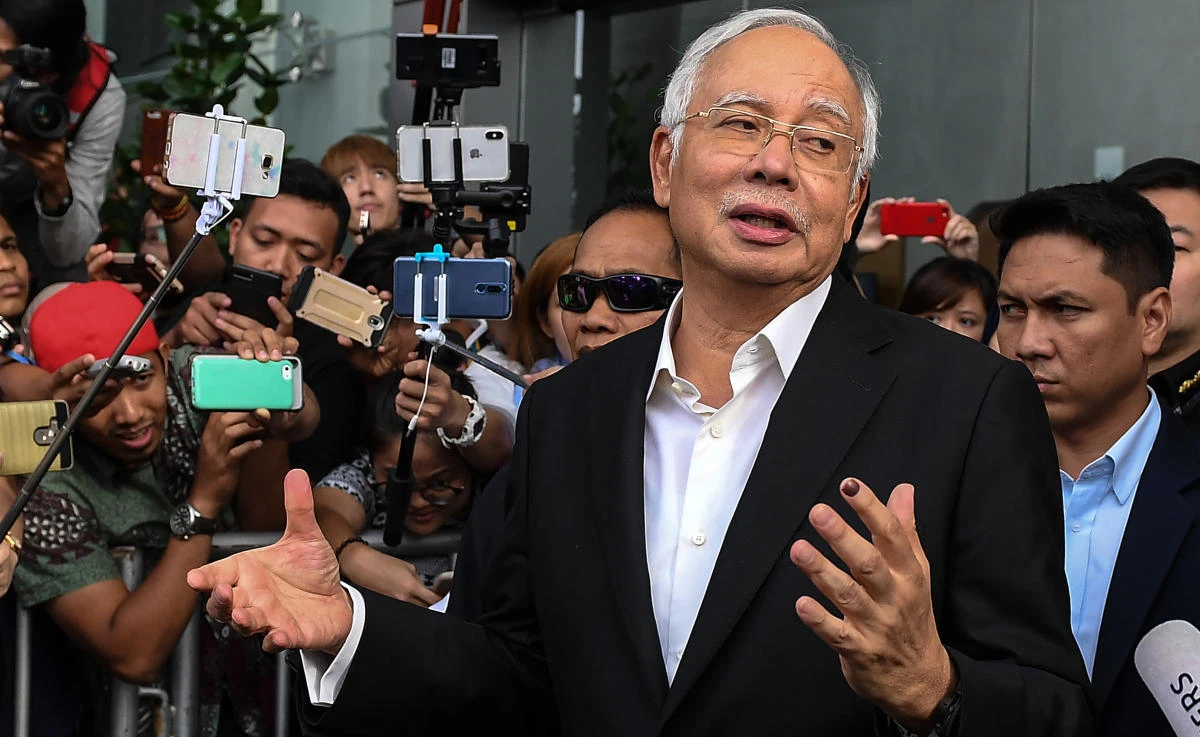 Former Prime Minister Najib Razak has been accused of being involved in huge kickbacks for the purchase of French submarines in 2002. (AFP)