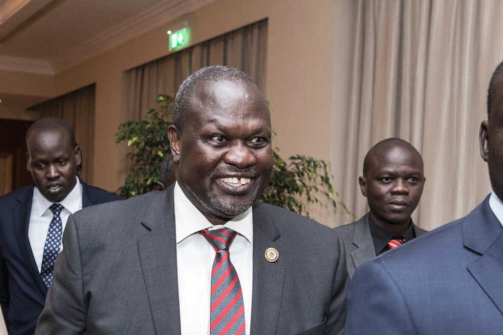The Sudan People's Liberation Movement-in-Opposition (SPLM-IO) rebel group leader Riek Machar (C) attends the 32nd Extraordinary Summit of Intergovernmental Authority on Development (IGAD) in Addis Ababa on June 21, 2018. (AFP)