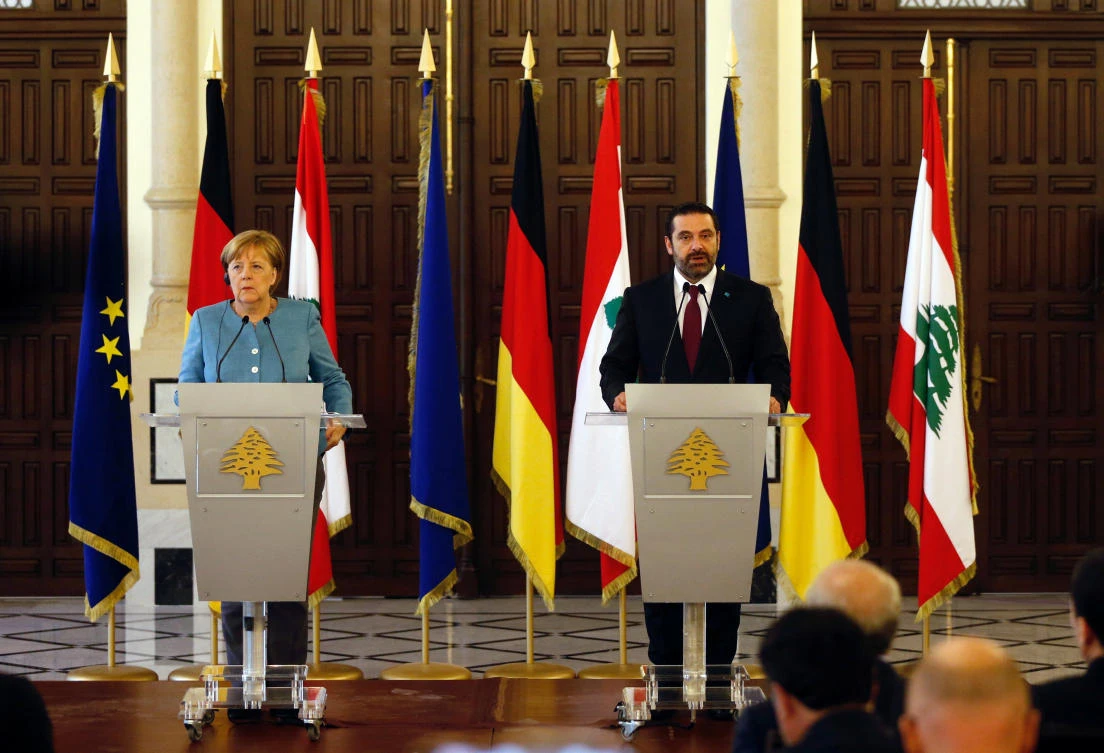 Photo showing Lebanese Prime Minister-designate Saad Al-Hariri talks during a joint news conference with German Chancellor Angela Merkel at the government palace in Beirut, Lebanon June 22, 2018. (Reuters)