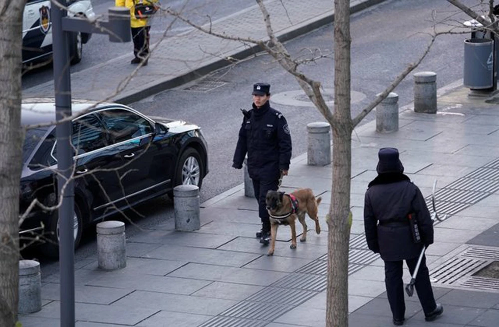 Police patrol outside the Joy City Mall in the Xidan district after a knife attack, in Beijing, in February. Eight people have been stabbed in the city of Xi’an in a frenzied attack that began on board a public bus. (Reuters)