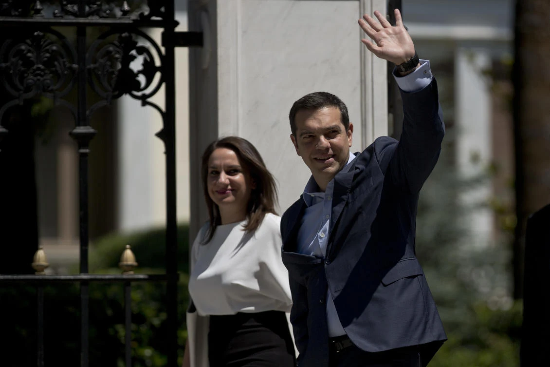 Greece ‘turning a page’ as eurozone declares crisis over