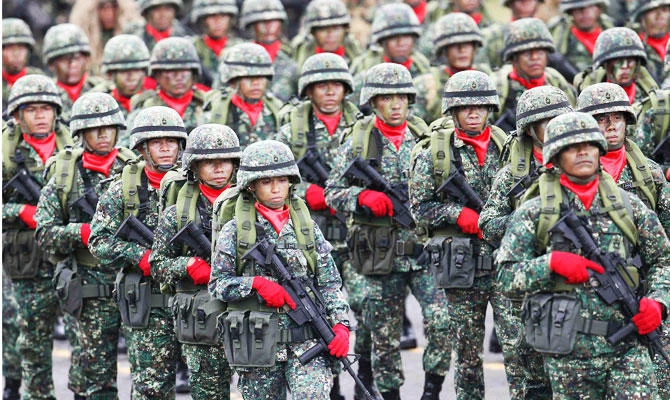 Soldiers take part in a parade during the 79th anniversary celebration of the Armed Forces of the Philippines in Quezon city, Manila December 18, 2014. (Reuters)