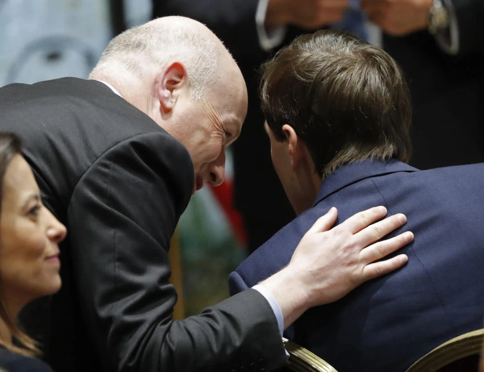 Jason Greenblatt (L), the US president’s assistant and special representative for international negotiations, speaks to White House senior adviser Jared Kushner during a press conference at the President’s Residence in Jerusalem. (File photo: AFP)