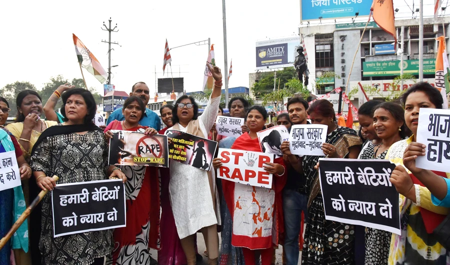 Indian National Congress party activist protest against the abduction and gang-rape of five charity workers in Ranchi on June 23, 2018. (AFP)