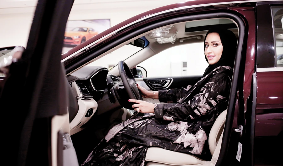 The lifting of the ban on women driving marks a milestone for women in the Kingdom who have had to rely on drivers, male relatives, taxis and ride-hailing services to get to work, go shopping and simply move around. (AP)