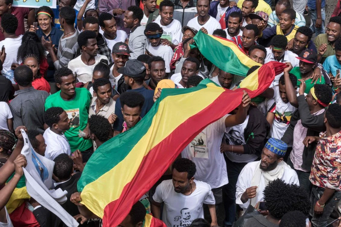 The organizer of the pro-government rally in Ethiopia that was hit by a grenade blast said the attacker had aimed for Prime Minister Abiy Ahmed but was stopped by police. (AFP / Yonas Tadese)