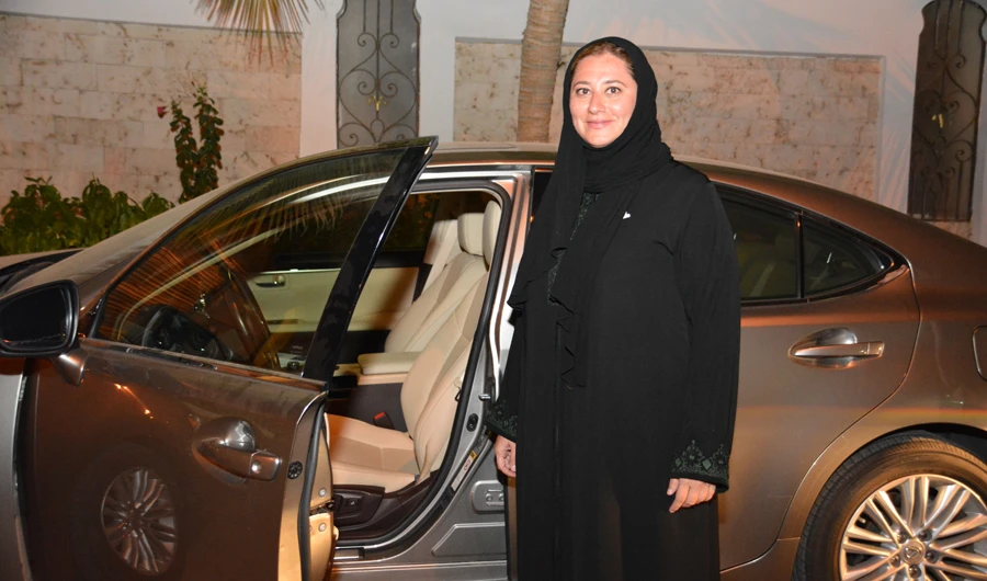 Shoura Council member Lina Almaeena getting ready to driver her car as Saudi Arabia lifted the ban on women driving iib Saturday midnight. (AN photo by Huda Bashatah)
