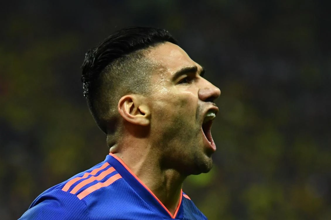 Colombia's forward Falcao celebrates after scoring during the Russia 2018 World Cup Group H football match between Poland and Colombia at the Kazan Arena. (AFP)