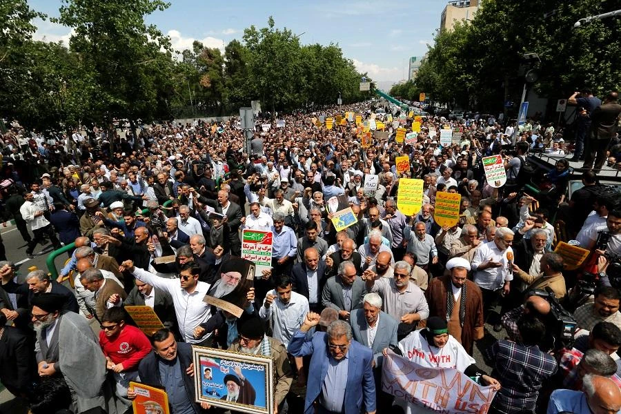 Videos: Iran protesters confront police at parliament