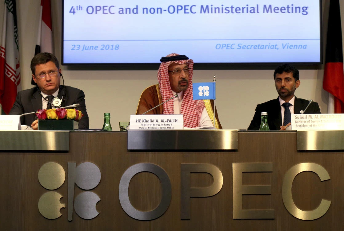 Russian Minister of Energy Alexander Novak, Khalid Al-Falih Minister of Energy, Industry and Mineral Resources of Saudi Arabia and Minister of Energy of the United Arab Emirates, UAE, Suhail Mohamed Al Mazrouei, fromm left, attend a news conference after a meeting of the Organization of the Petroleum Exporting Countries, OPEC, and non OPEC members at their headquarters in Vienna, Austria, Saturday, June 23, 2018. (Ronald Zak/AP)