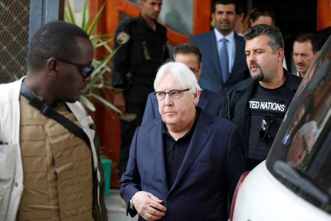 UN envoy to Yemen Martin Griffiths is escorted by bodyguards as he arrives at Sanaa airport in Sanaa, Yemen. (Reuters)